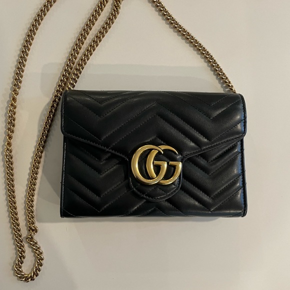 Black Gucci GG Marmont chain mini flap bag with Double G hardware. - Picture 2 of 8